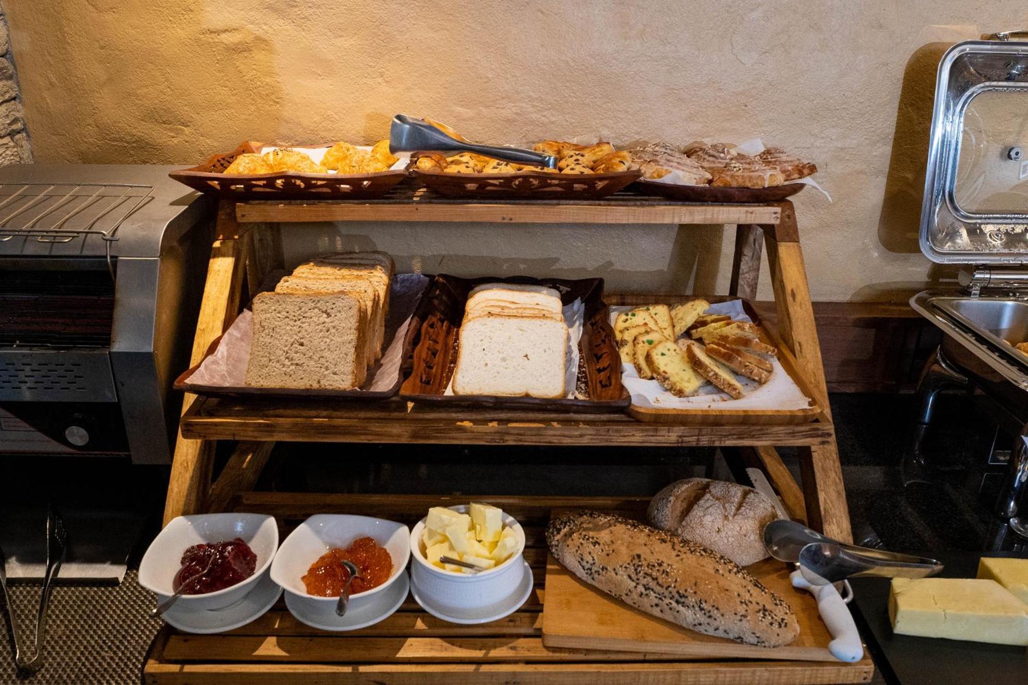 Bar Peepal Resort Покхара Екстер'єр фото A selection of cheeses at a buffet